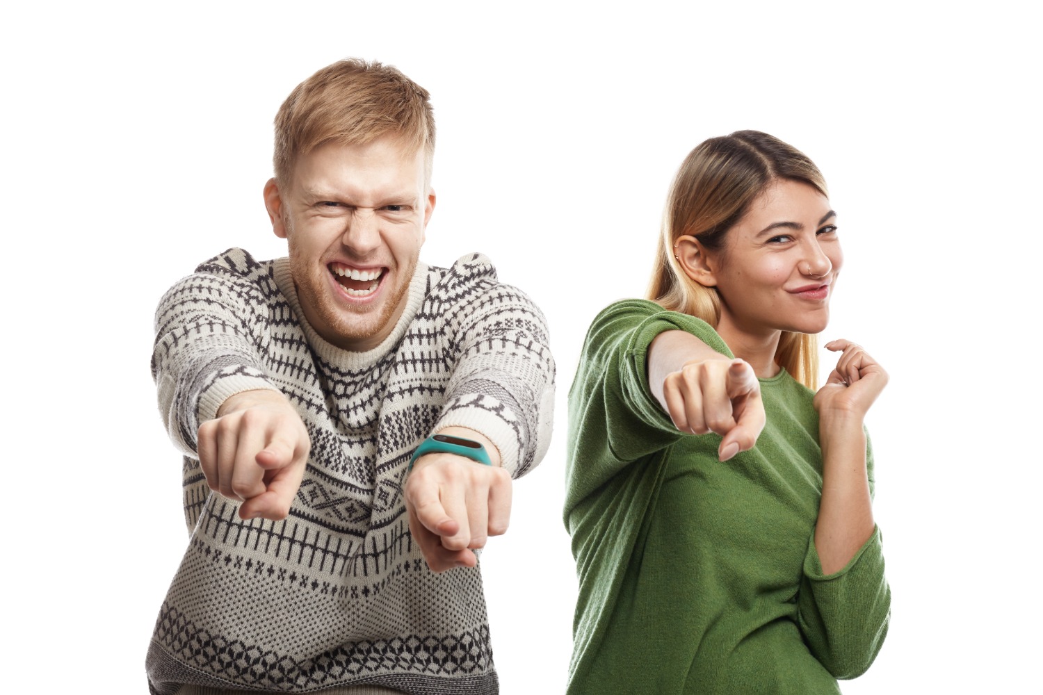 A man and a woman pointing at you and happy