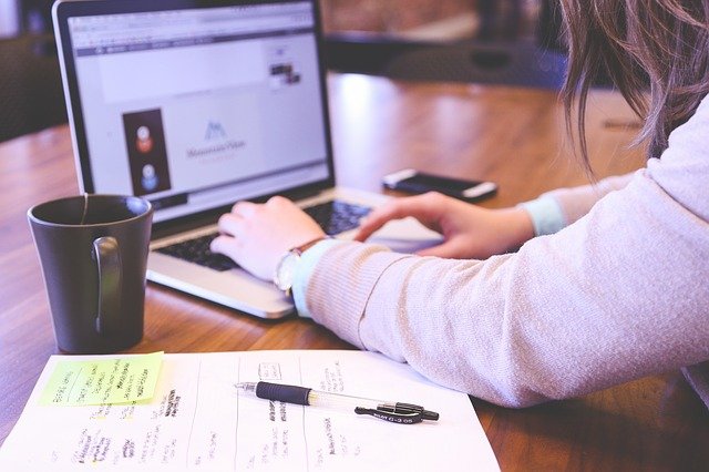 Female student looking at a computer